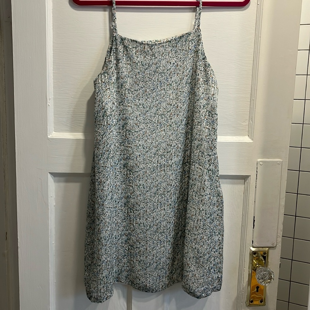Sheer mini dress. Lined.